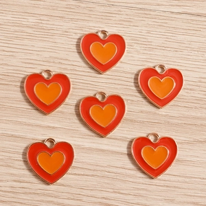 Ciondoli a cuore a doppio strato in smalto rosso e arancione con bordi dorati per DIY