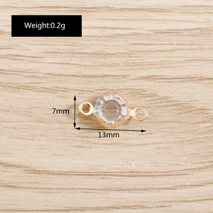 Detailed view of 13mm gold crystal connector showing dimensions and weight 0.2g