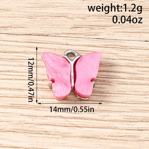 Detail showing pink glitter acrylic butterfly charm with 14x12mm dimensions and silver loop