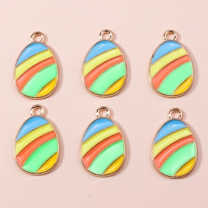 Detail view of colorful striped Easter egg charms for DIY jewelry and accessories
