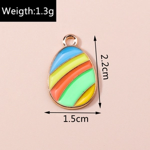 Detail shot of colorful striped Easter egg pendant showing 2.2cm height and 1.5cm width