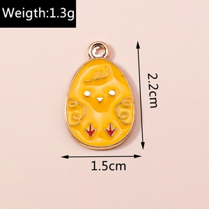 Detailed view of yellow enamel cartoon chick pendant showing 2.2cm height and 1.5cm width