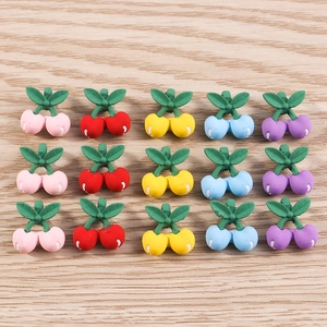 Colorful resin cherry charms for DIY jewelry making in pink red yellow and blue