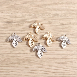 Set di ciondoli a foglia di trifoglio vintage in oro e argento per gioielli fai-da-te