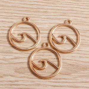 Three minimalist geometric wave pendants in gold plating for DIY jewelry crafting