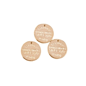 Set of three round light gold geometric pendants with embossed branded lettering for DIY