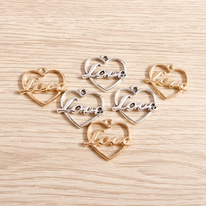 Golden and silver heart-shaped Love charms for DIY jewelry making and necklaces