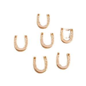 Gouden hoefijzer hangertjes met Luck en Good gravures voor DIY sieraden maken