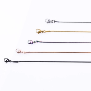 Detail of 1.2mm stainless steel snake chains with lobster clasps in five various finishes