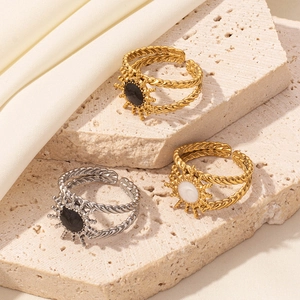 304 stainless steel sunburst sun rings with black and white drip oil set on stone