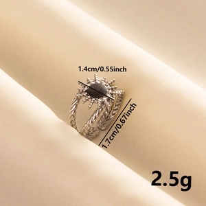 Detail shot of vintage 304 stainless steel sun ring with black enamel and dimensions