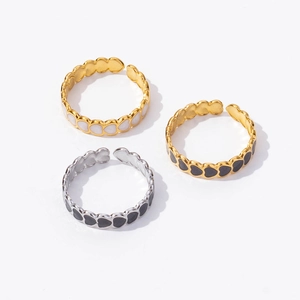 Three minimalist stainless steel open rings with colorful heart-shaped enamel drops