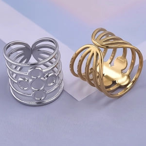 Detailed macro of multi-layer hollow line ring with polished petal pattern