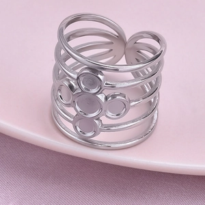 Close-up of a 304 stainless steel multi-layer open ring with DIY resin bases