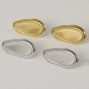 Detailed macro view of 304 stainless steel geometric earrings with matte and polished finish