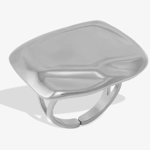 Detailed macro view of silver irregular square ring with lava-inspired texture