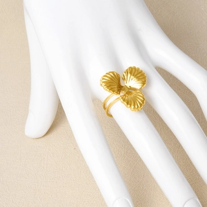 Minimalist 304 stainless steel adjustable golden clover ring on a white hand model