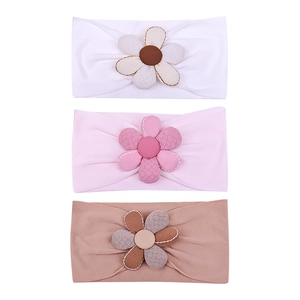 Lot de trois bandeaux élastiques pour bébé avec fleurs en blanc, rose et café clair