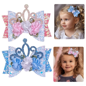 Children's glitter flower crown hair clips in pink and blue colors for girls