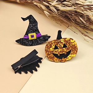 Halloween wizard hat and pumpkin glitter hair clips for kids on minimalist background