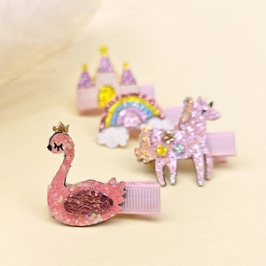 Détail de barrettes à paillettes cygne et arc-en-ciel pour filles avec pinces en ruban