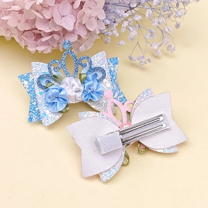 Sparkly blue glitter crown and flower bow hair clips for kids with alligator clips