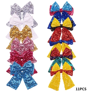 Detailed set of 11 glitter sequin hair bows for girls in multiple vibrant colors