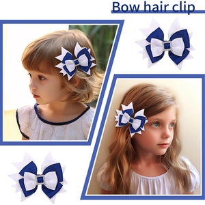 Navy and white rhinestone bow hair clip for girls with a classic grosgrain ribbon design