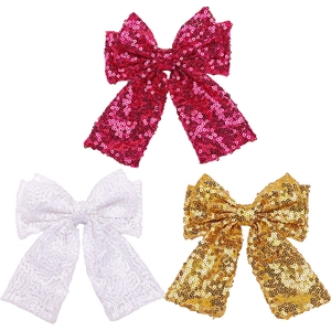 Set of three sequined bow hair clips in pink, silver and gold for little girls