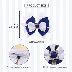 Detail view of navy blue and white grosgrain bow hair clip with rhinestone center buckle