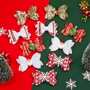 Detailansicht der 10-teiligen Weihnachts-Glitzerschleifen mit Nikolaus- und Rentier-Motiv