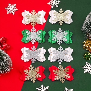 Lot de huit barrettes de Noël festives avec flocons de neige et nœuds à paillettes