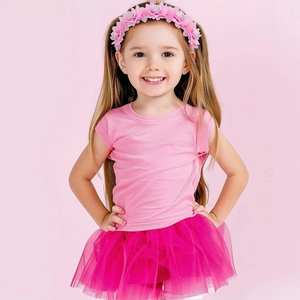 Detail of pink floral headband with layered tutu skirt and cotton t-shirt for girls