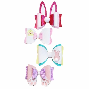 Set of four sequin Easter hair clips featuring rabbit ears and yellow chicks for children