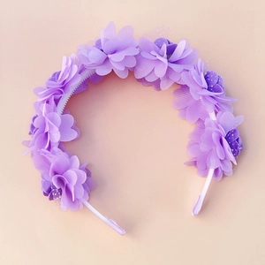 Detail view of purple chiffon flower headband for girls with delicate white lace accents