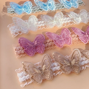 Embroidered butterfly lace baby headbands in sky blue, pink, white, and champagne colors