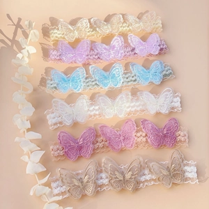 Detailed close-up showing six colorful lace butterfly headbands with embroidery on elastic bands