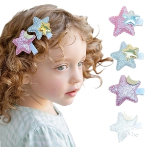 Cute glitter star and moon hair clips for girls featuring colorful sequins and ribbon wrap