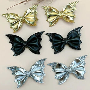 Halloween bat wing hair bows for girls in gold, black and silver glitter fabric