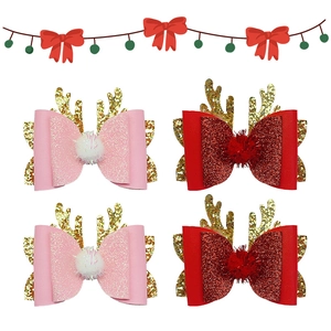 Christmas reindeer antler hair clips with glitter bows and plush pom poms for girls