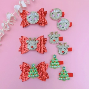 9-piece Christmas hair clips set with gingerbread man, reindeer and tree embroidery