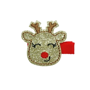 Detailed view of reindeer Christmas hair clip with glitter finish and red ball nose