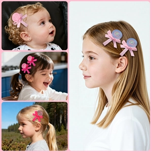Detail showing pink ribbon bow and colorful spiral lollipop hair clip for children