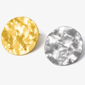 Detail view of 304 stainless steel oval earrings with hammered texture in gold and silver