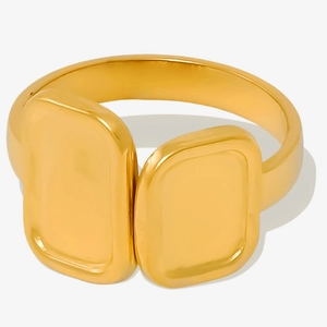 Detail of the golden square overlapping ring showing the textured lava metal surface