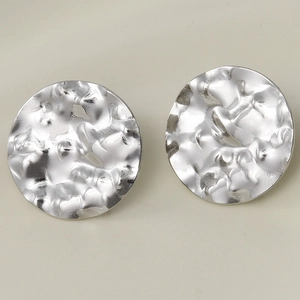 Detailed close-up of 304 stainless steel earrings with hammered silver texture and finish