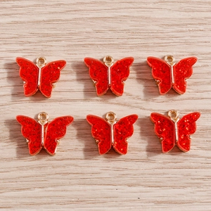 Pack of red butterfly charms with gold metal frames and sequins for DIY jewelry