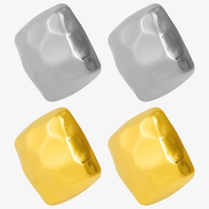 Detailed macro view of gold and silver textured square 304 stainless steel earrings