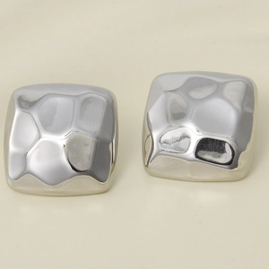 Close-up of square hammered silver earrings with textured surface in 304 stainless steel