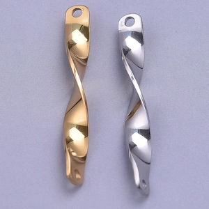 Detailed view of twisted spiral 304 stainless steel pendants in gold and silver mirror finish